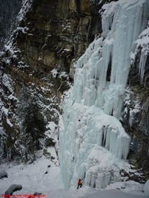 ice climber below The Pillars near Field, BC