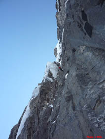 ice climber on mixed pitch of French Reality at the Stanley Headwall